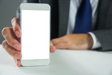 Digital png photo of man's hand holding smartphone with copy space on transparent background