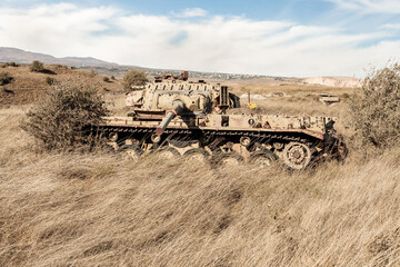 A Israeli  tank destroyed during Yom Kippur War is located in Valley of Tears near OZ 77 Tank Brigade Memorial on Golan Heights in northern Israel