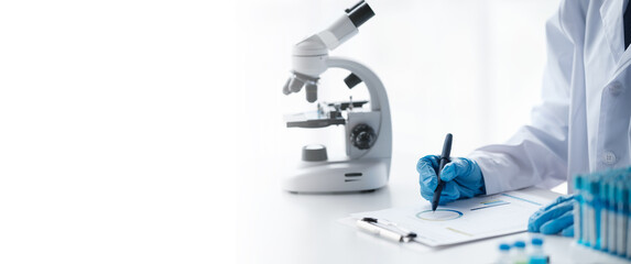 Scientist analyze biochemical sample in advanced scientific laboratory. Medical professional check...