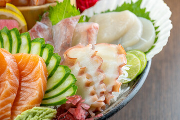 sashimi mixed fresh set japanese food variation in dish. Sashimi Japanese food, Sashimi set with wasabi, fish, shrimp in plate of Assorted. fresh slide mix fish set on ice menu in restaurant