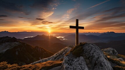 Christian cross on the top of a mountain at susnet. - obrazy, fototapety, plakaty