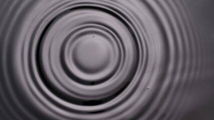 Monochrome light contrasted water surface with big circles, abstract background, wallpaper template.