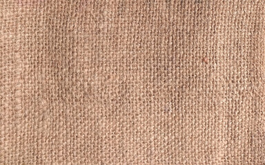 Fototapeta na wymiar Natural jute burlap texture. Material woven from jute thread. Hessian texture