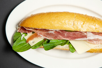 sandwich with ham and vegetables