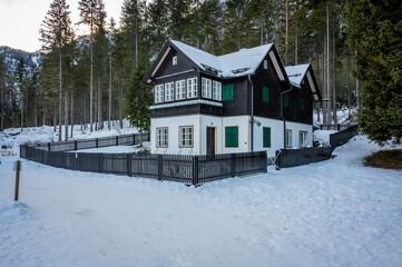 Lake Dobbiaco. Treasure chest among the Dolomites. Winter atmosphere.