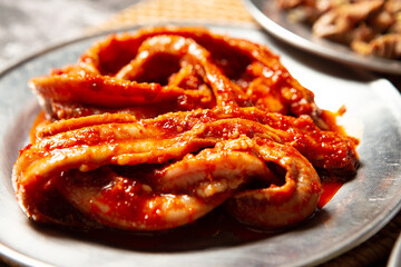 Spicy seasoned raw meat on a plate