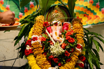 Hindu God Ganasha with Flower Petals
