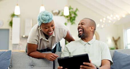 Black couple, laughing and tablet on a home sofa for streaming, meme and internet in a living room....