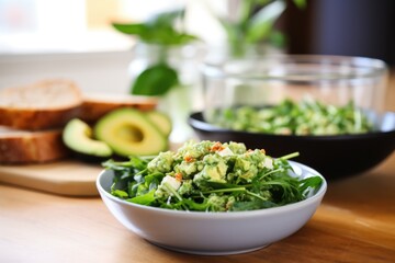 avocado salad with toasted bread in background
