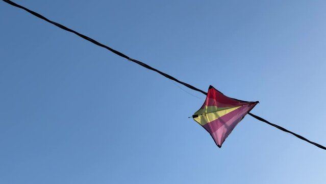 kite stuck in the electric power lines