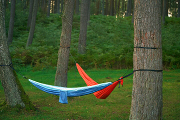 Obraz na płótnie Canvas Hammocks in the forest. Outdoor rest concept.