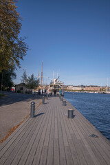 Moored sailing boat at a pier on the island Skeppsholmen, a sunny autumn day in Stockholm