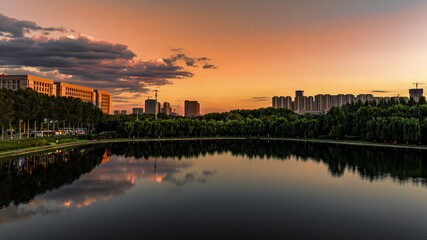 Fototapeta premium Sunset landscape of southern new town in Changchun, China 
