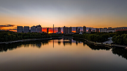Fototapeta na wymiar Sunset landscape of southern new town in Changchun, China 