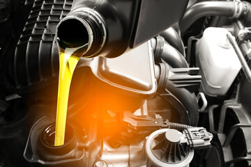 Refueling and pouring oil quality into the engine motor car Transmission and Maintenance Gear.Energy fuel concept