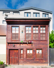 Facade of traditional wooden residential building, at an alley in Mimar Sinan neighborhood, Uskudar district, Istanbul, Turkey