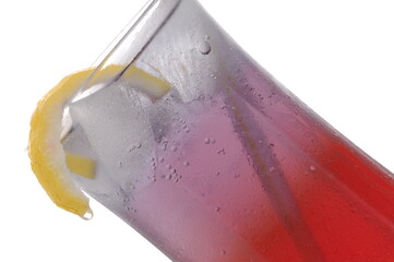 Lemon peel raspberry Cocktail Mocktail shot against a white background with props and garnish