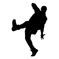 Silhouette of a male dancer in performing pose. Silhouette of a dancing man.