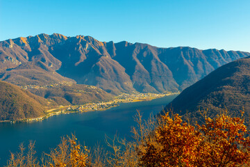 Panoramic View over Lake Lugano and Village with Mountain in a Sunny Day in Vico Morcote, Ticino in...