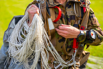 Military Parachuter Holding His Parachute in Switzerland.