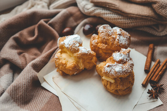 Freshly baked choux pastries close up