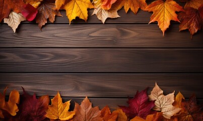 Obraz premium wooden background with autumnal leaves, copy space frame
