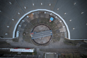 railway turntable or wheelhouse is a device for turning locomotives aerial panorama landscape view of train museum and railway station © Semi