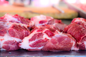 Fresh pork on the market stall