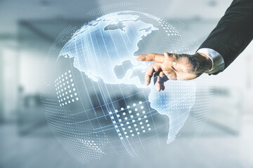 Double exposure of man hand presses on digital map of North America on blurred office background, research and strategy concept