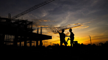 Engineer Teamwork Concept,Worker team join hands together in construction site.	
