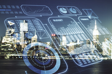 Multi exposure of creative statistics data hologram on New York city skyscrapers background, stats and analytics concept