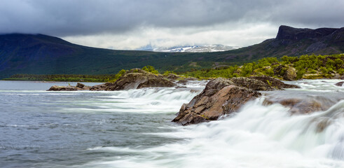 Scenic Waterfall in Stora Sjöfallets National Park, Sweden