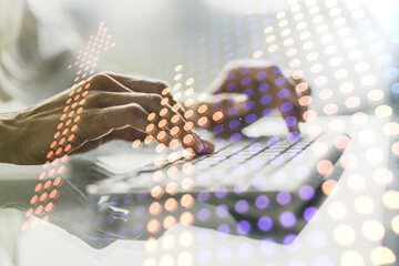 Double exposure of creative abstract upward arrows hologram and hands typing on laptop on background. Ambition and challenge concept