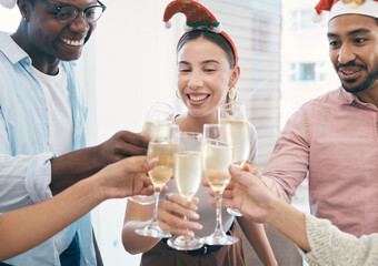 Champagne, Christmas party and toast with group of people at office, celebration and fun with holiday and alcohol. Wine, cheers and employees at work event for Xmas, happy and diversity with drinks