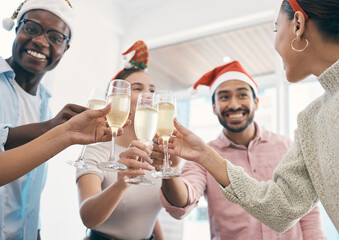 Champagne, Christmas party and toast with people at office, group celebration and fun with holiday and alcohol. Wine, cheers and employees at work event for Xmas, happy and diversity with drinks