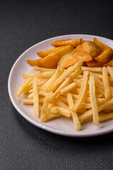 Fresh delicious crispy French fries with salt and spices
