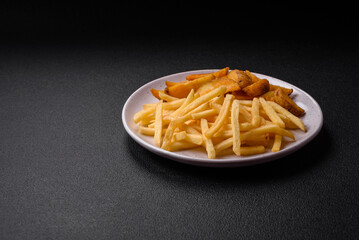 Fresh delicious crispy French fries with salt and spices