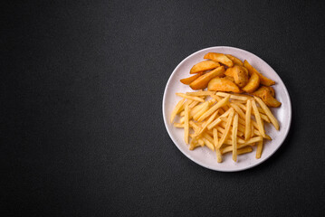 Fresh delicious crispy French fries with salt and spices