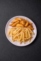Fresh delicious crispy French fries with salt and spices