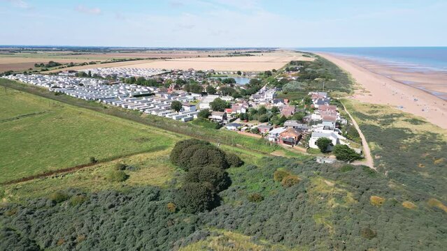 Aerial video footage highlights the natural charm of Anderby Creek, a serene and unspoiled beach in the town of Anderby on the Lincolnshire coast.
