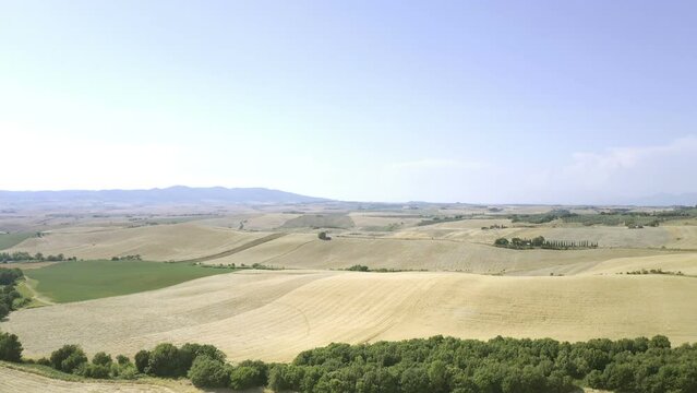 Landscaped land with harvested or ready to harvest fields of wheat