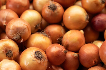 Onions in farmer's market. A group of onion. Vegetable concept idea. Selective Focus.