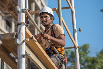 Indian worker working on construction site