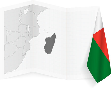 Madagascar grayscale map and hanging flag.