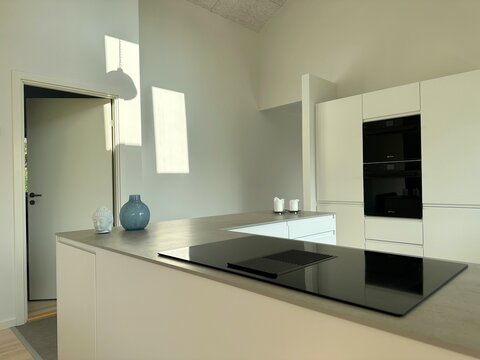 Chic contemporary open plan kitchen in a new build house, Denmark