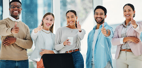 Smile, thumbs up and portrait of business people in office in collaboration for team building. Happy, diversity and group of professional creative designers with approval hand gesture in workplace.