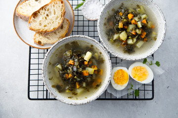 Traditional nettle soup with hard boiled egg