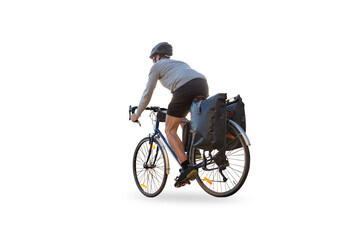 Cyclist on a bicycle with panniers riding along