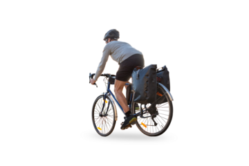 Cyclist on a bicycle with panniers riding along