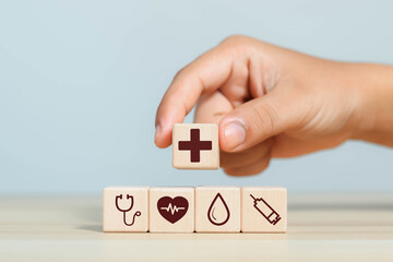 Businessman shows medical network wooden block for health, medicine, insurance, healthcare, care, concept. Medical technology services to solve public health problems. medical business digital and hea